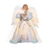 An white woman angel tree topper with white cloth