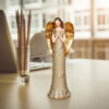 The display effect of gold guardian angel statue on a bedside desk