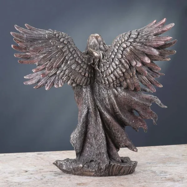 The back of vintage bronze seraphim guardian angel statue