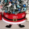 The front of red Christmas tree collar on a decorated Christmas tree