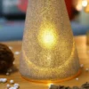 The bottom details of LED light changing glass Christmas tree