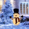 A glowing Snowman Christmas ornament yard decoration