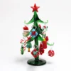 There back side of green glass Christmas tree with ornaments