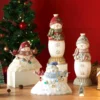 Four Snowman Christmas ornaments LED lighted resin figurines