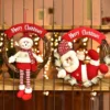 A Snowman and a Santa plush rattan door hanging wreaths