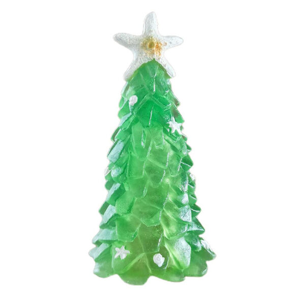 There is a green glass Christmas tree