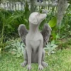 There is a dog angel statue in the garden