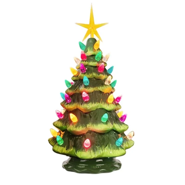 There is a glowing 11" green vintage ceramic Christmas tree