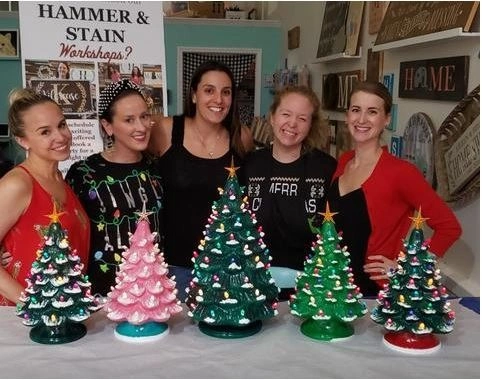 people gathered and buying ceramic christmas tree