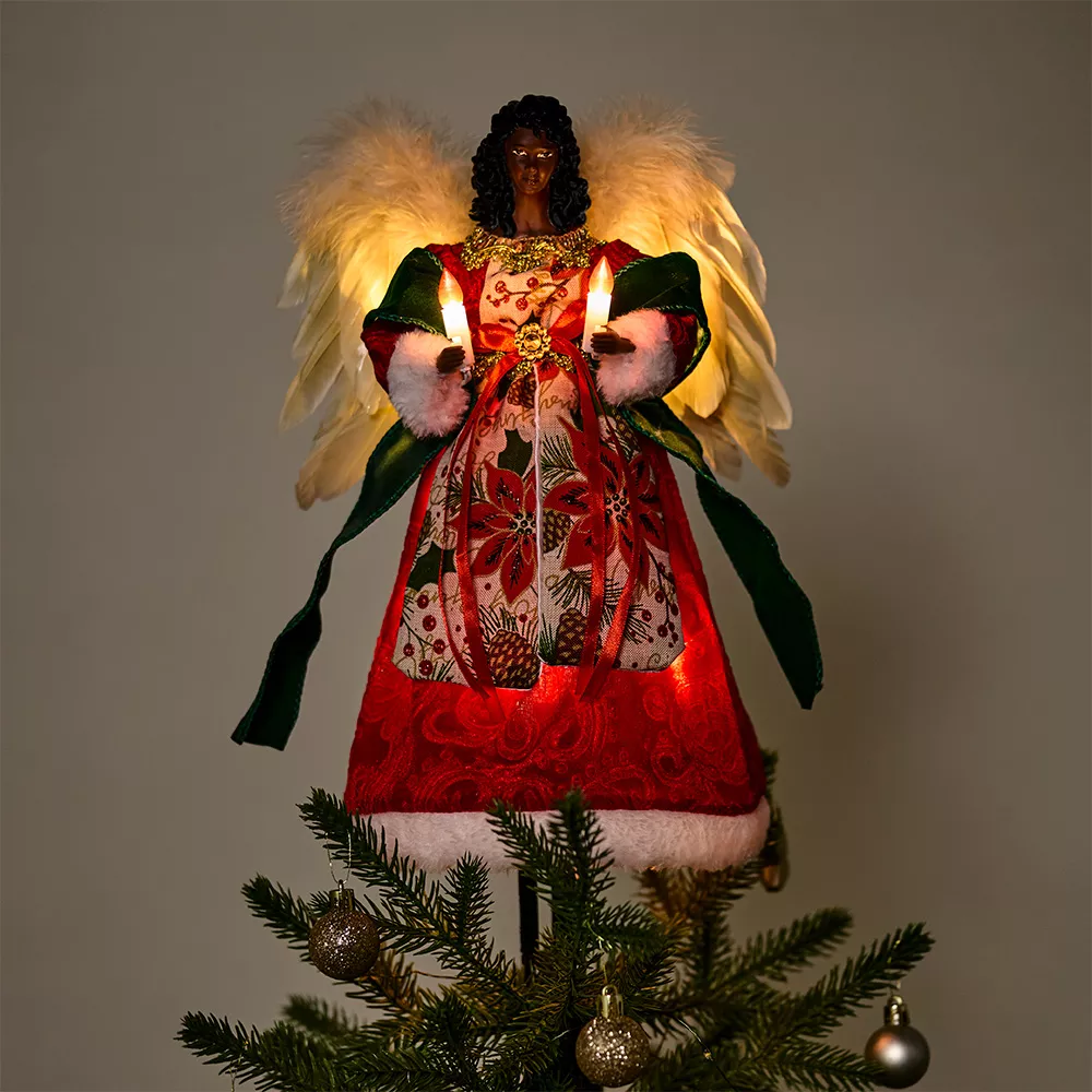 An African American Angel Tree Topper with Candle Lights in the Dark