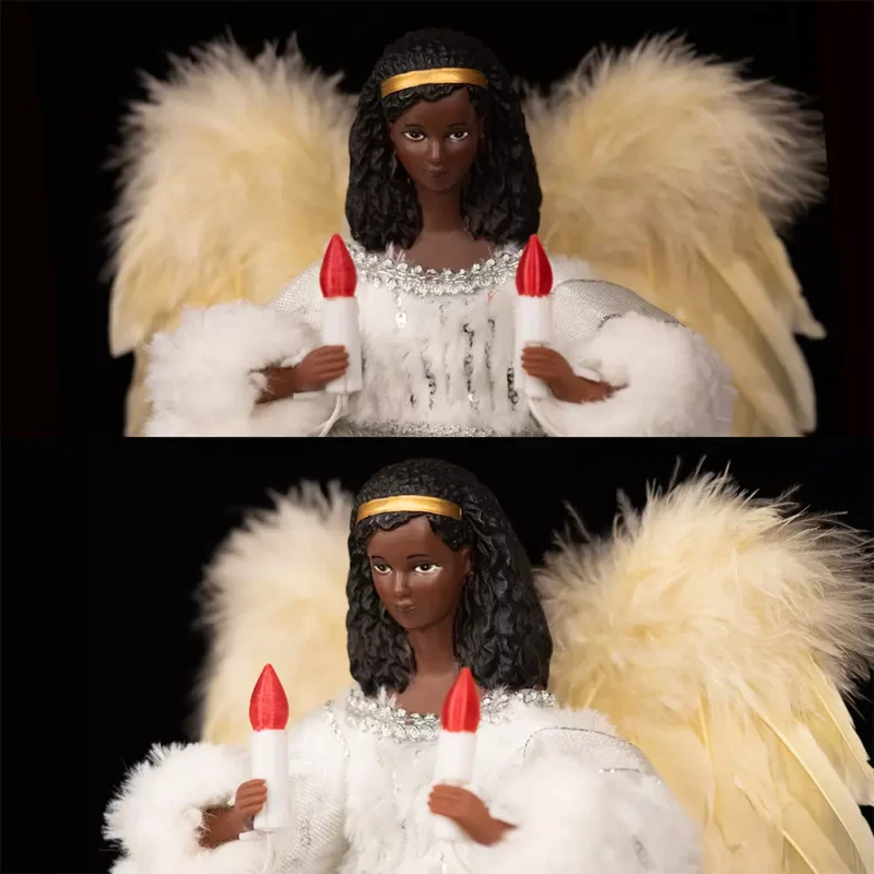 The face of the black woman angel tree topper dressed with white cloth