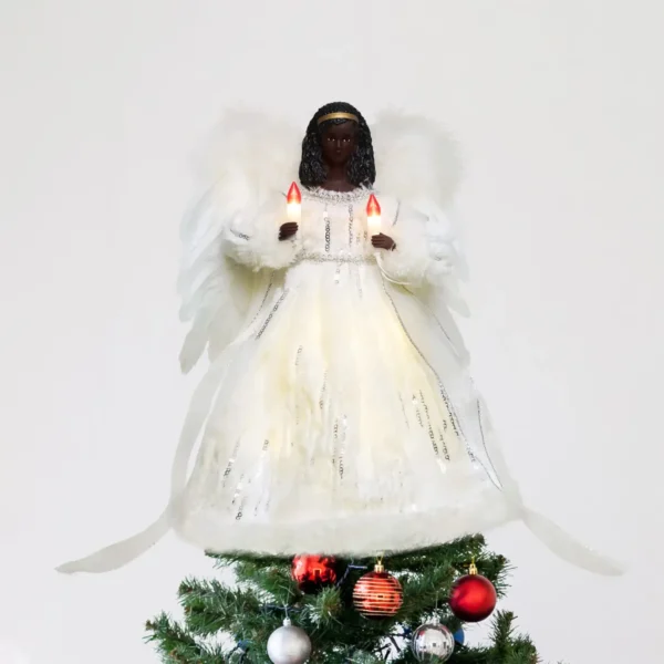 A 12-inch gold animated black angel tree topper stands on the tree
