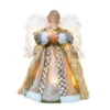 An white woman angel tree topper with gold cloth