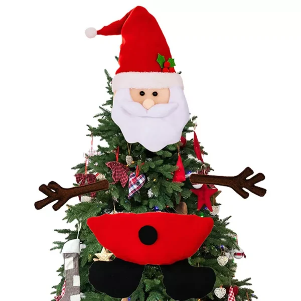 There is a Santa father Christmas tree topper on top of a Christmas tree