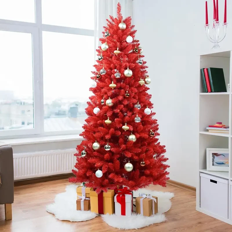 A red flocked Christmas tree with many decorations hanging on it
