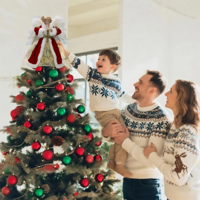 Heartwarming Christmas moment: father helps boy put angel tree topper while mother looks on smiling