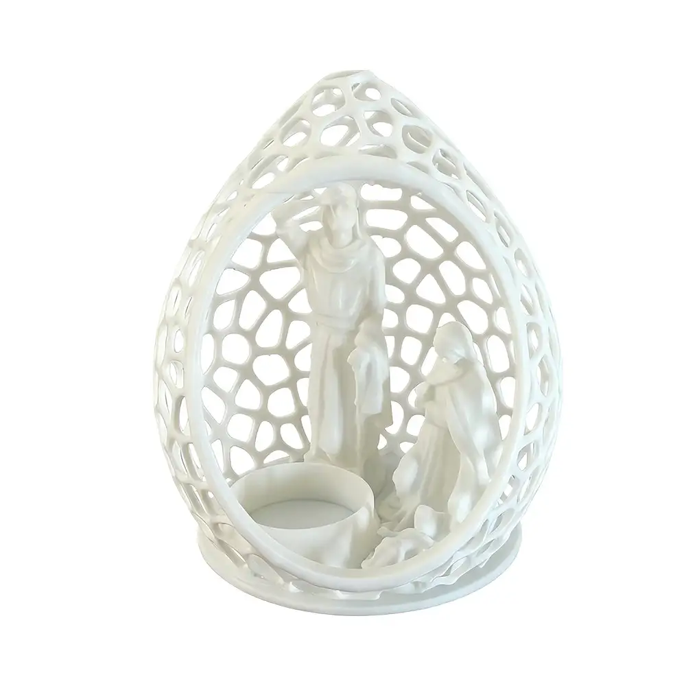 The front view of the white nativity scene indoor.