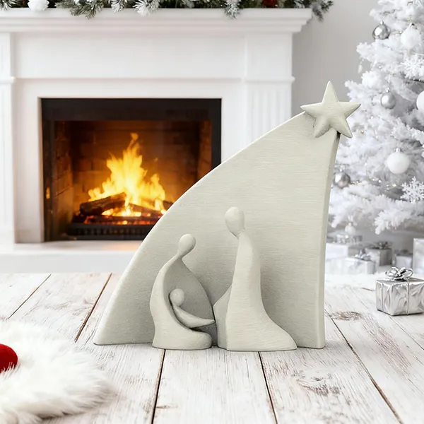 A modern minimalist nativity scene is on the table.