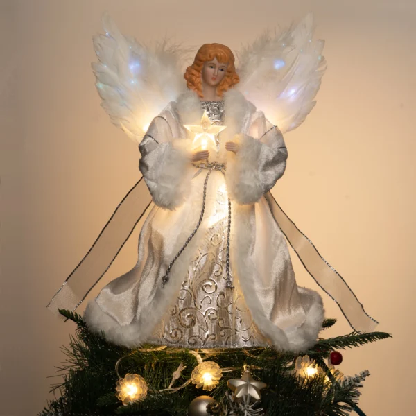 Silver fiber optic angel Christmas tree topper, white feather fiber-optic wings, warm glowing star, placed on Christmas tree